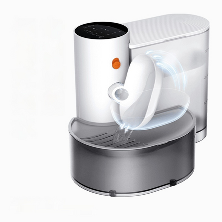 Modern kitchen appliance with a clear container and white handle on a white background