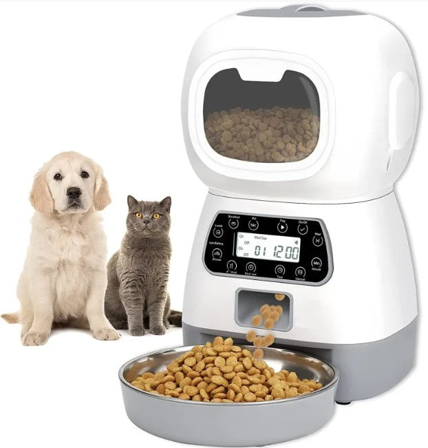 Pet food dispenser with a dog and cat sitting next to it on a white background