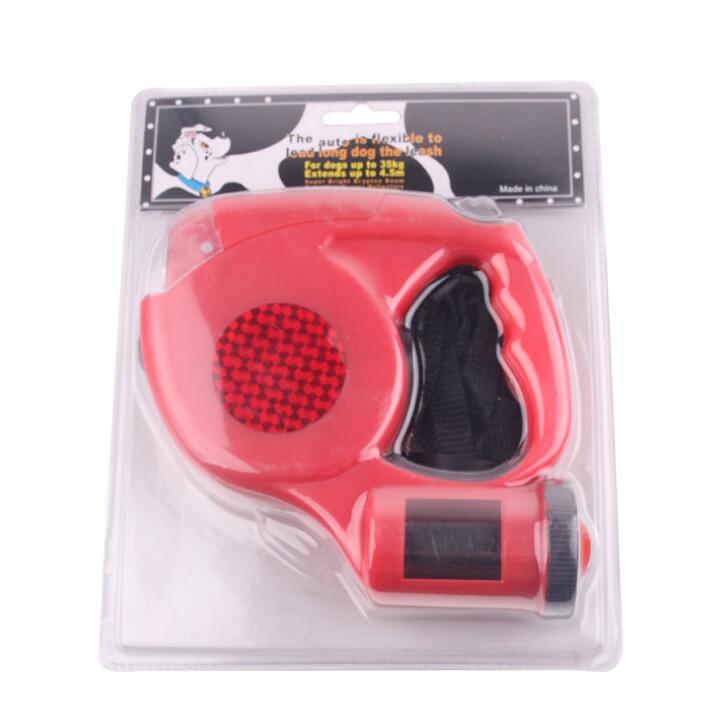 Red retractable dog leash in packaging with brand label