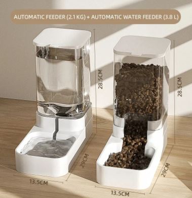 Two automatic pet feeders with dimensions displayed on a wooden surface.