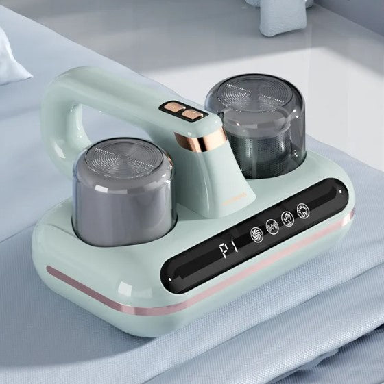 Green vacuum device on a light gray surface
