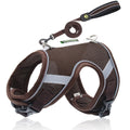 Brown dog harness with reflective strip and matching leash on a white background