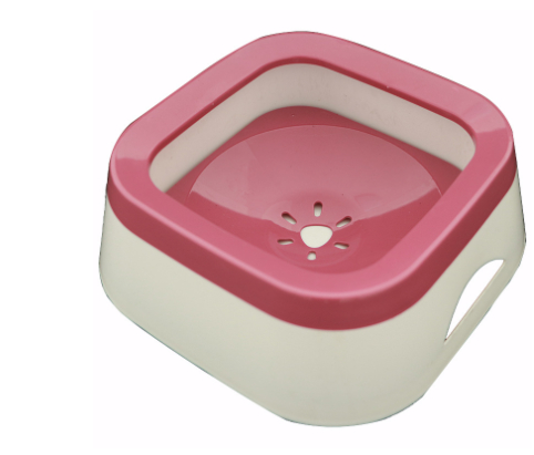 Pink and beige pet bowl on a white background