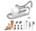 Pet grooming tool set with attachments on a white background