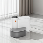 White and gray pet step on a tiled floor with curtains in the background
