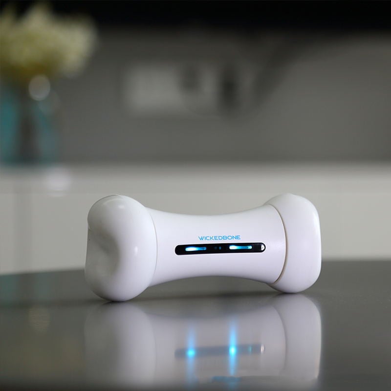 White electronic device with blue lights on a reflective surface