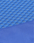 Close-up of blue textured fabric with a grid pattern