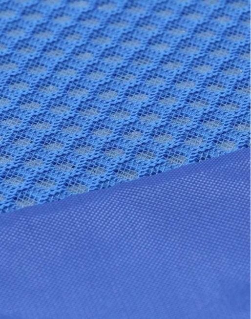 Close-up of blue textured fabric with a grid pattern