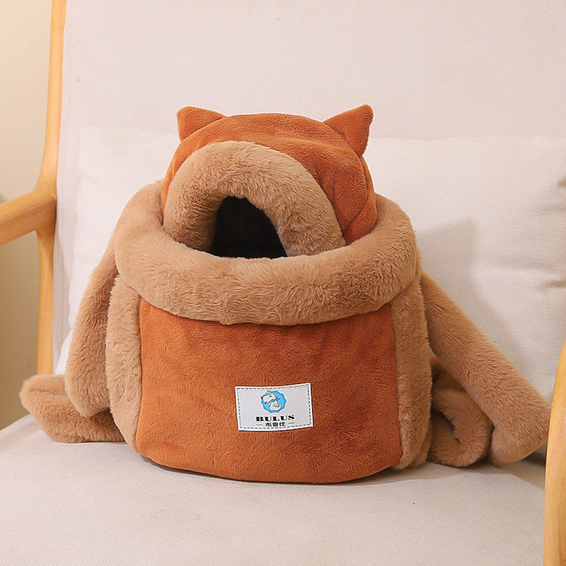 Fox-shaped pet bed with a visible brand label on a light background