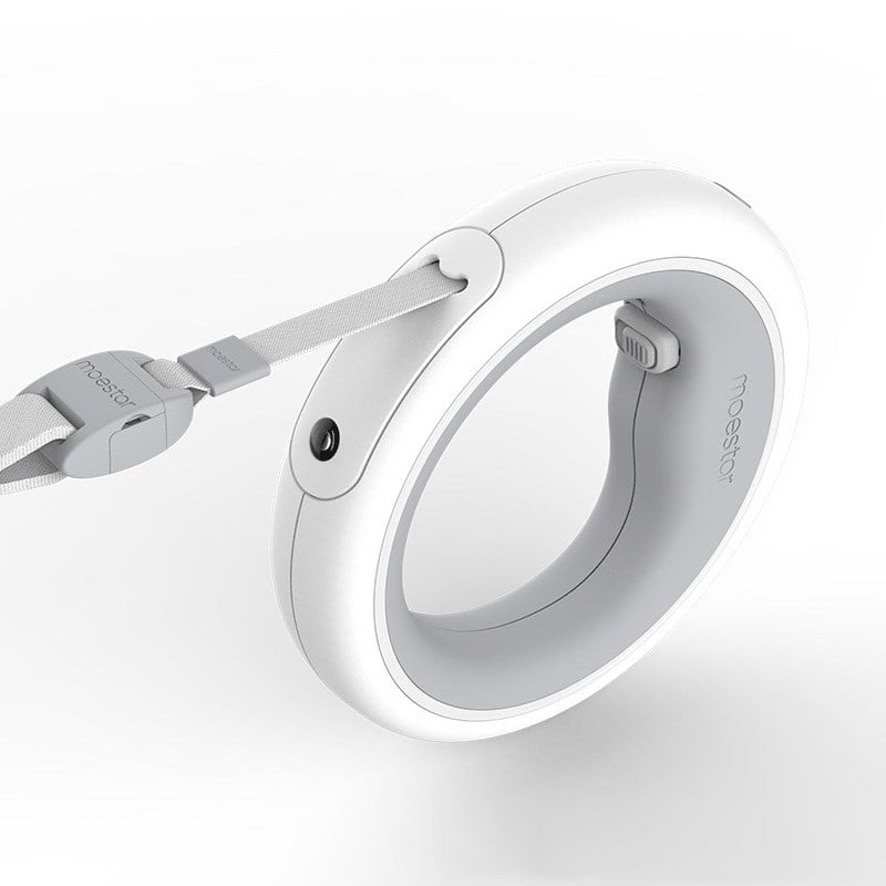 Silver dog collar with a leash attachment on a white background