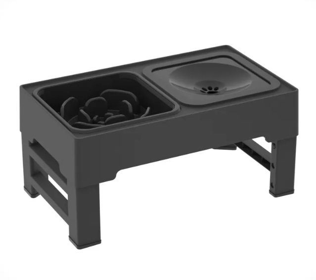 Black elevated pet feeder with two bowls on a white background