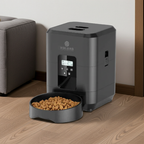 Pet food dispenser with a bowl of kibble on a wooden floor next to a gray couch.