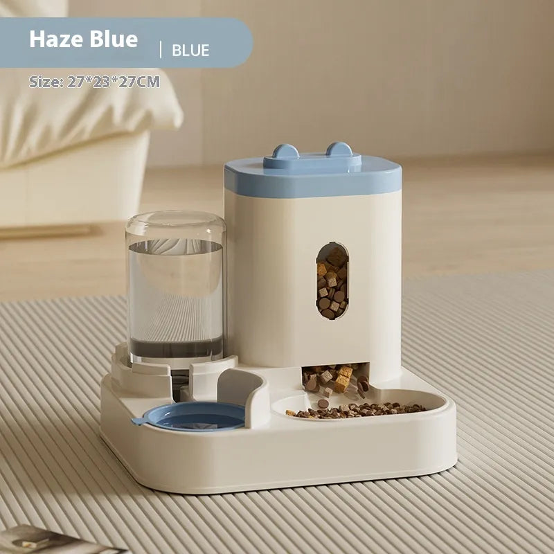 automatic gravity pet feeder and water dispenser on a textured surface, labeled 'Haze Blue'.